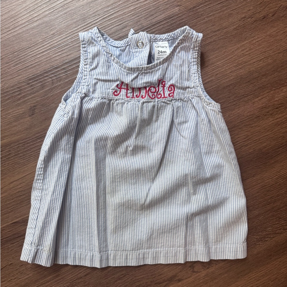 Amelia Carter's Baby Shirt with Red Embroidery